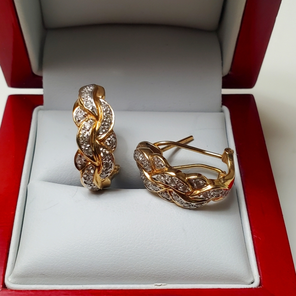 14kt solid yellow gold earring and diamonds.